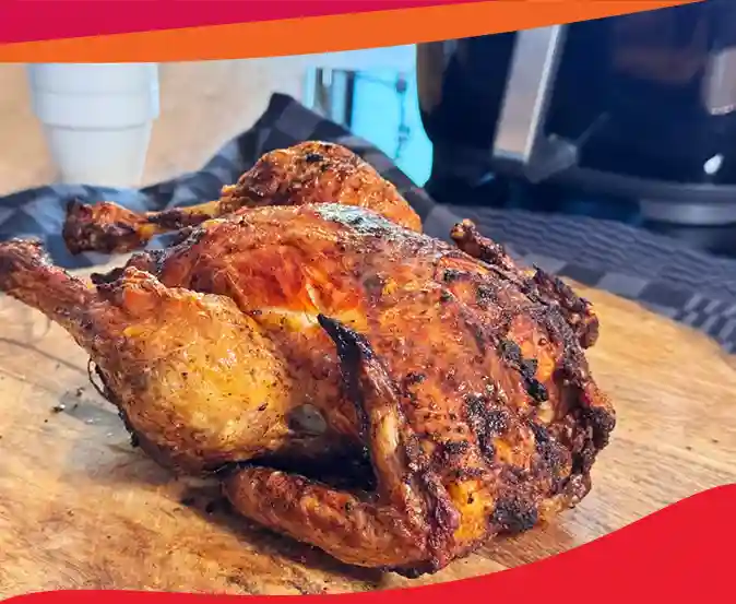 Air fryer whole chicken, crispy, juicy, and ready in one hour