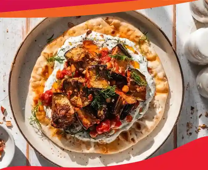 Tray bake spiced aubergine flatbread with yogurt-herb sauce